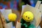 Smiling face on yellow flower decoration