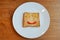 The smiling faces painted on the slice bread, Happy breakfast Concept