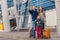 Smiling family with child at airport