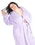 Smiling fat woman in bathrobe