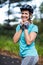 Smiling female athletic wearing bicycle helmet