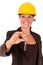 Smiling female building contractor