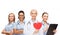 Smiling female doctor and nurses with red heart