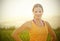 Smiling Female Jogger at Sunset