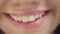 Smiling female mouth with white teeth. Closeup woman face with perfect smile