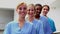 Smiling female nurses looking at camera