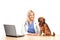 Smiling female veterinarian with a puppy