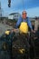 Smiling fisherman with lobster traps, Sakonnet, Rhode Island