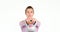 Smiling fit woman lifting up kettlebell