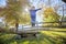 Smiling five year old boy jumping with red cape outside