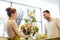 Smiling florist woman and man at flower shop