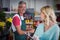 Smiling florists interacting with each other