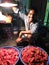 Smiling and friendly flower seller, Georgetown flower market Chennai Tamil Nadu India