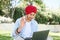 Smiling and friendly hindu male freelancer wearing national turban pagg using laptop for video meeting