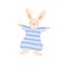 Smiling funny rabbit in striped overalls vector flat illustration. Happy bunny wearing cute pajamas isolated on white