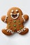 Smiling gingerbread man cookie isolated on a white background