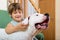 Smiling girl on couch with dog