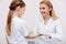 Smiling girl giving her hand for inoculation