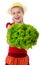 Smiling girl with lettuce salad