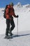 Smiling girl on snowshoe trip