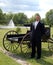 Smiling groom and carriage