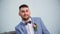 Smiling groom show gesture thumb up in wedding bow tie looking at camera closeup