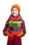 Smiling Happy Caucasian Little Girl In Orange Beanie, Scarf and Mittens With Pile of Colorful Giftboxes.