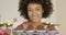 Smiling happy woman with tray of fresh muffins