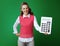 Smiling healthy learner woman showing big white calculator