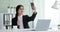 Smiling Indian Businesswoman Capturing selfie using smartphone on office