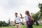 Smiling interracial schoolkids giving high five