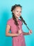smiling kid with braided hair after hairdresser, fashion