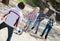 Smiling kids playing street football outdoors