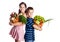 Smiling kids with vegetables in basket