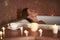 Smiling lady take relaxed spa bath with candle