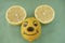 Smiling lemon mouse face.