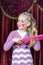 Smiling little blond girl wearing pantomime makeup