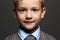 Smiling little boy.stylish child in suit and tie