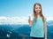 Smiling little girl giving glass of water