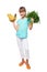 Smiling little girl holding fresh parsley and bananas