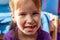 Smiling little girl missing a tooth with her mouth open showing teeth portrait, closeup Happy child without the front tooth