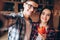 Smiling love couple makes selfie on the kitchen