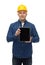 Smiling male builder in helmet with tablet pc