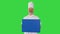 Smiling male chef cook holding blank board on a Green Screen, Chroma Key.
