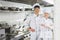 smiling male and female chefs looking at camera