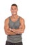 Smiling Man In Gray Tank Top Posing With Arms Crossed