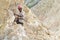 Smiling man labour working during the day on the limestone hill