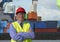 Smiling Man Standing Near Container Terminal