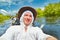 Smiling man taking selfie photo on kayak