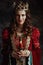 smiling medieval queen in red dress with candle and crown